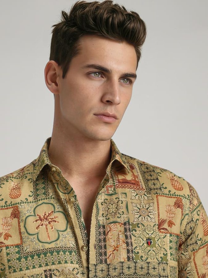Catalogue model in an olive tropical print shirt, close crop