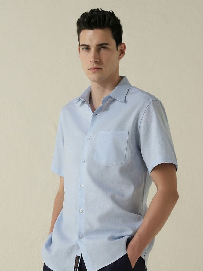 Catalogue model in a light blue shirt