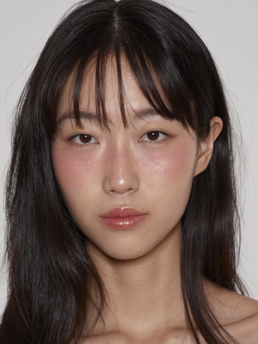 The new head: woman with straight black hair and bangs