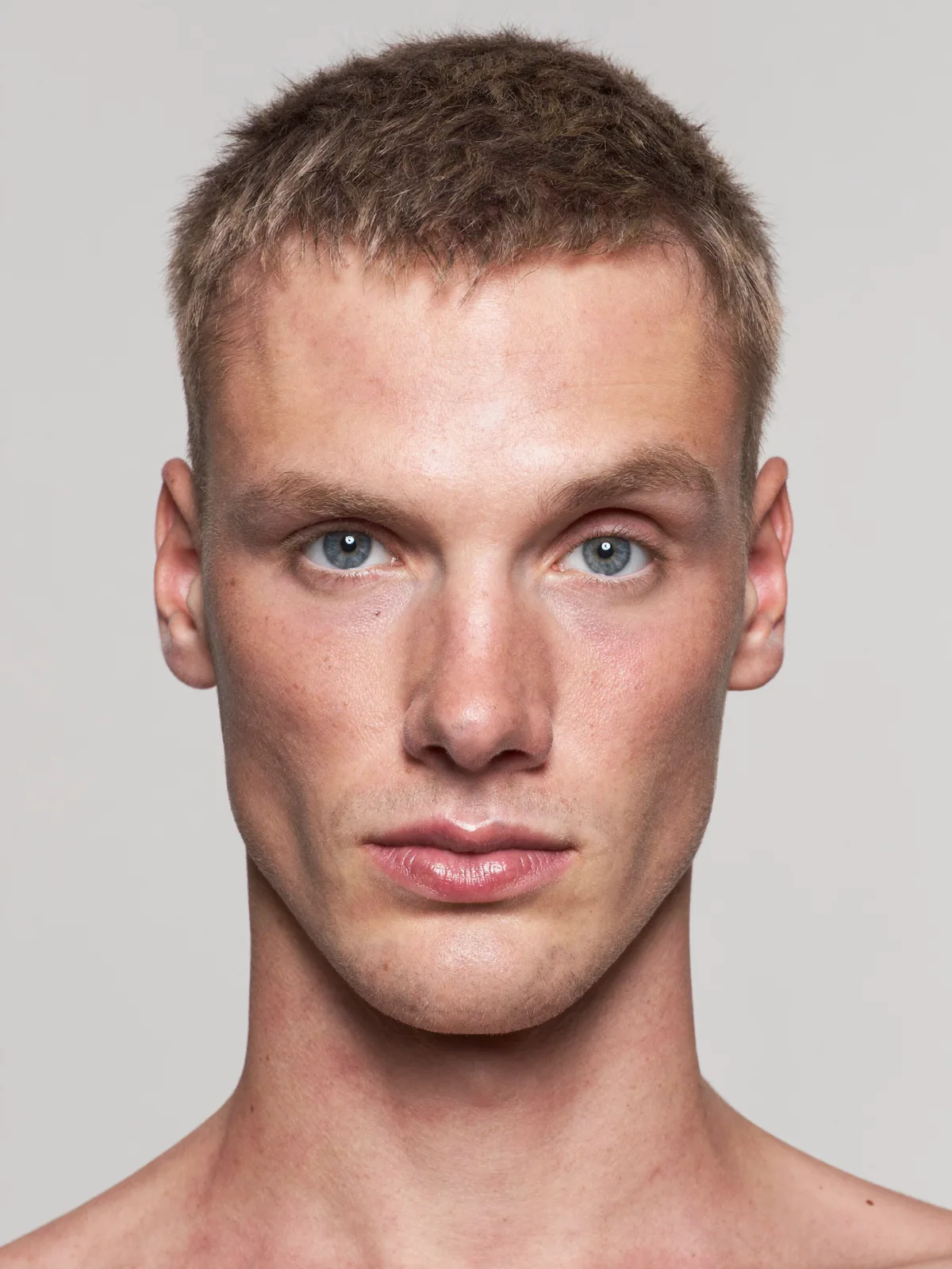 Reference face: portrait photo of the head used for the coastal cliffs photo